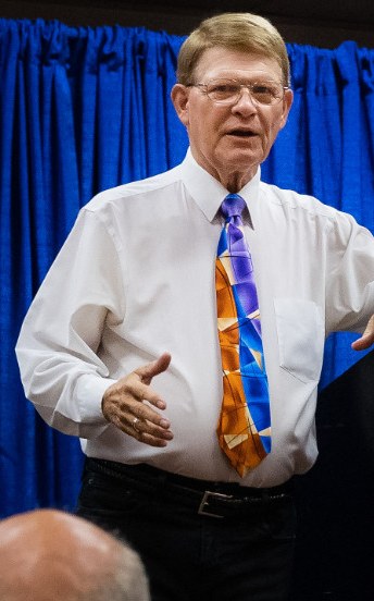 Mark Wade speaking to a live audience